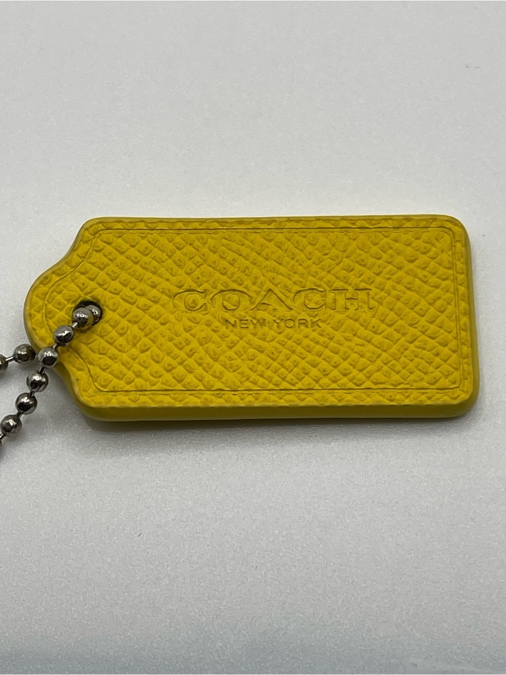 Coach Yellow Pebble Leather Hang Tag